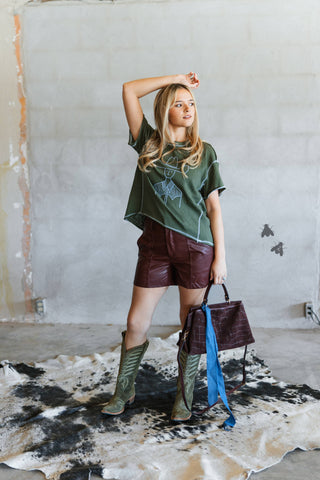 Staredown Stitch forest-green Western graphic tee with blue chain stitching