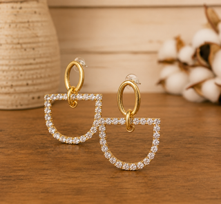 Lucinda Gold Horsebit Earrings in Diamond